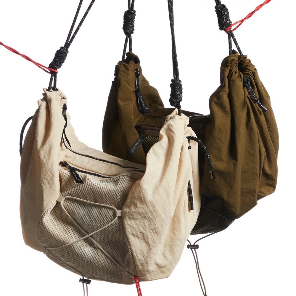 FP Movement by Free People Drawstring Crossbody Bag in Beige and Olive